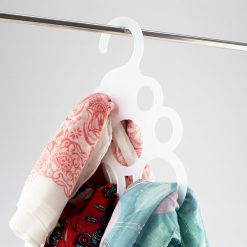 Frosted acrylic scarf hanger with scarves
