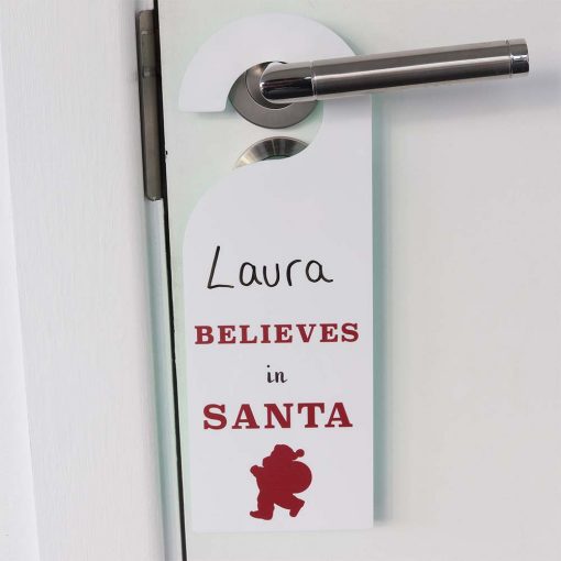 Believes In Santa Door Hanging Sign on door